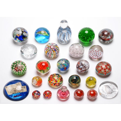 A quantity of glass paperweights, including