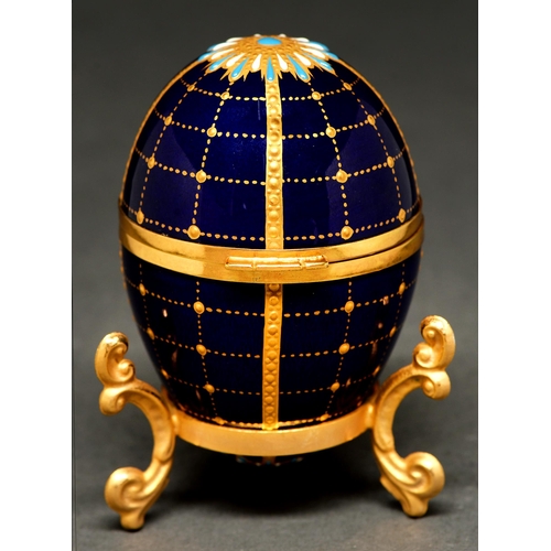 A Lynton silver gilt mounted egg,