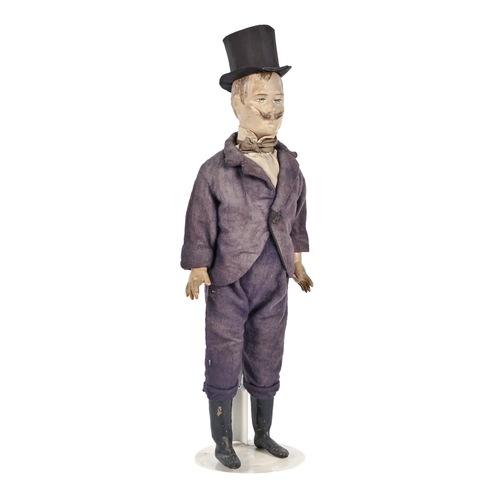 A vintage doll of a Victorian gentleman,
