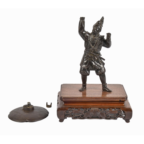 A Japanese bronze statuette of a samurai,