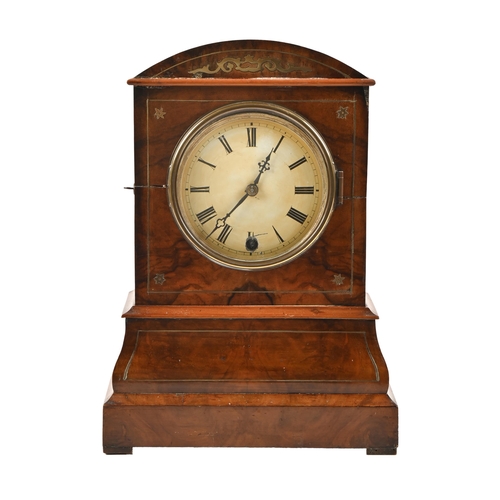 A brass inlaid walnut mantel clock,