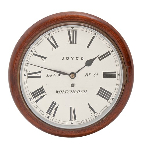 Railway clock. A mahogany wall timepiece,