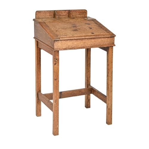 An oak child's desk, mid 20th c,