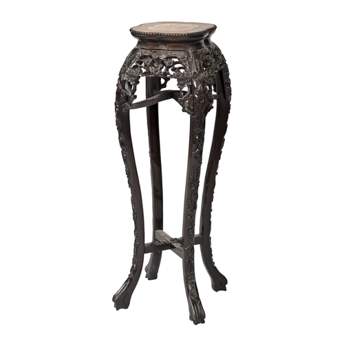 A Chinese carved hardwood jardiniere