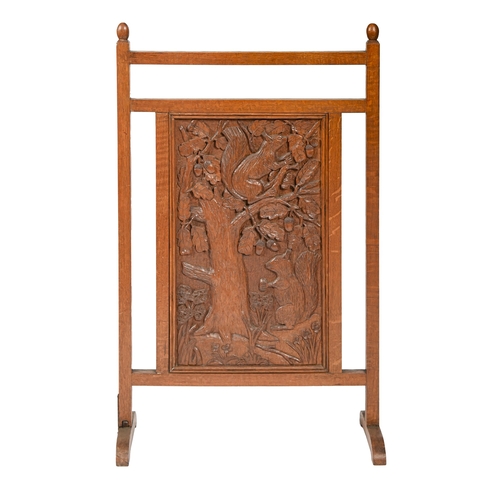 An oak firescreen incorporating