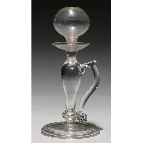 A glass open flame oil lamp, late