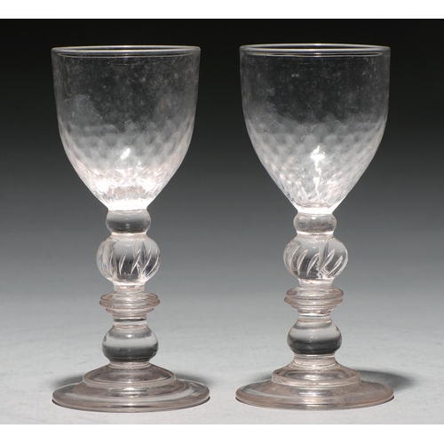 A pair of glass goblets, 19th c,  