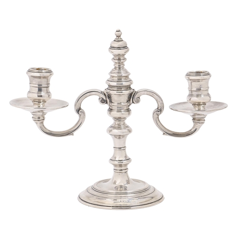 A George VI silver candelabrum,