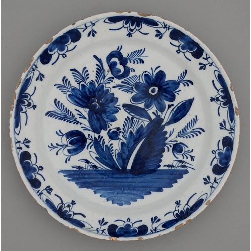 A Dutch Delftware dish, 18th c,