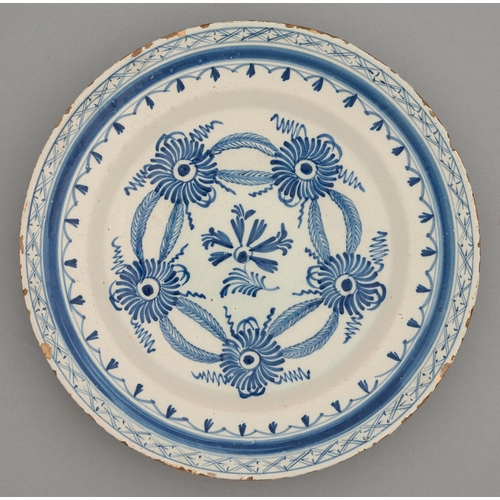 A Dutch Delftware dish, 18th c, painted