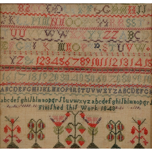 A Victorian linen sampler, over