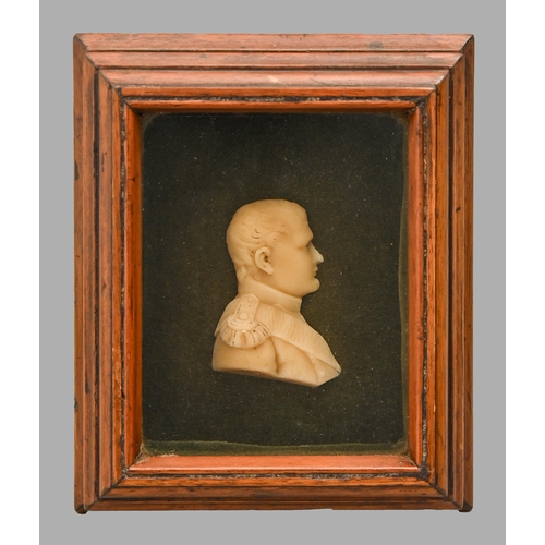 A wax portrait relief of Napoleon