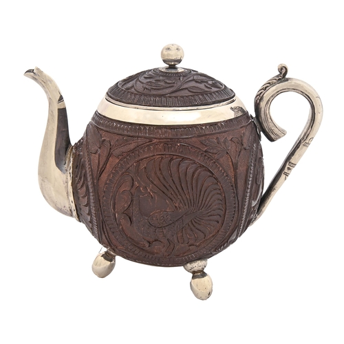 An Indian silver mounted coconut teapot