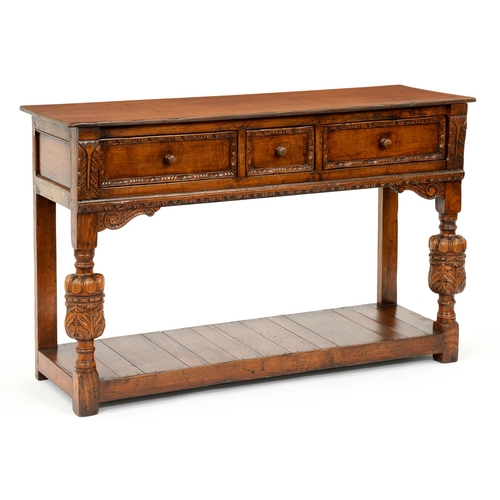 A Charles II style oak dresser, 20th