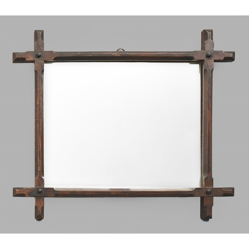 A Victorian oak  mirror,  in