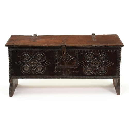 A Charles II oak chest, the front