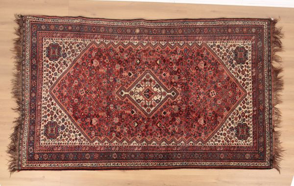 AN ANTIQUE QASHAI SHIRAZ CARPET