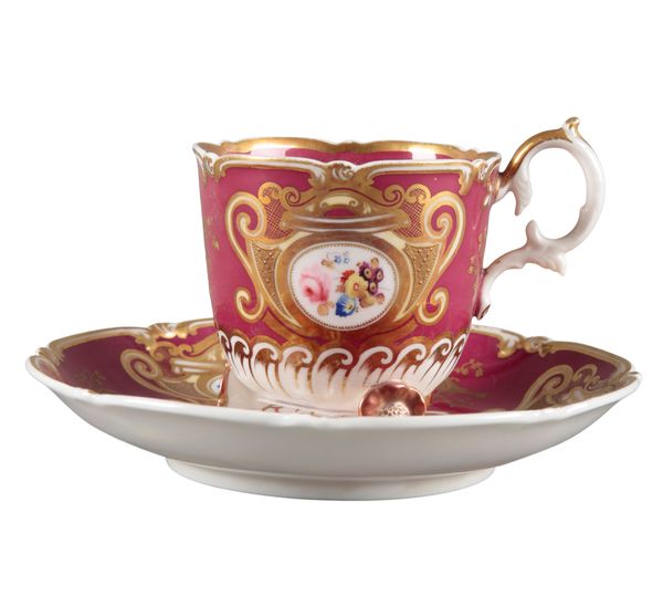 AN H & R DANIEL C-SCROLL CUP AND