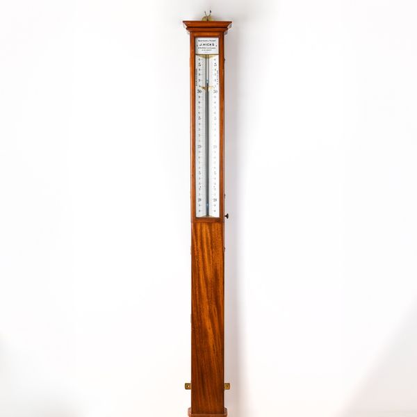 A LARGE MAHOGANY SHOP WINDOW BAROMETER