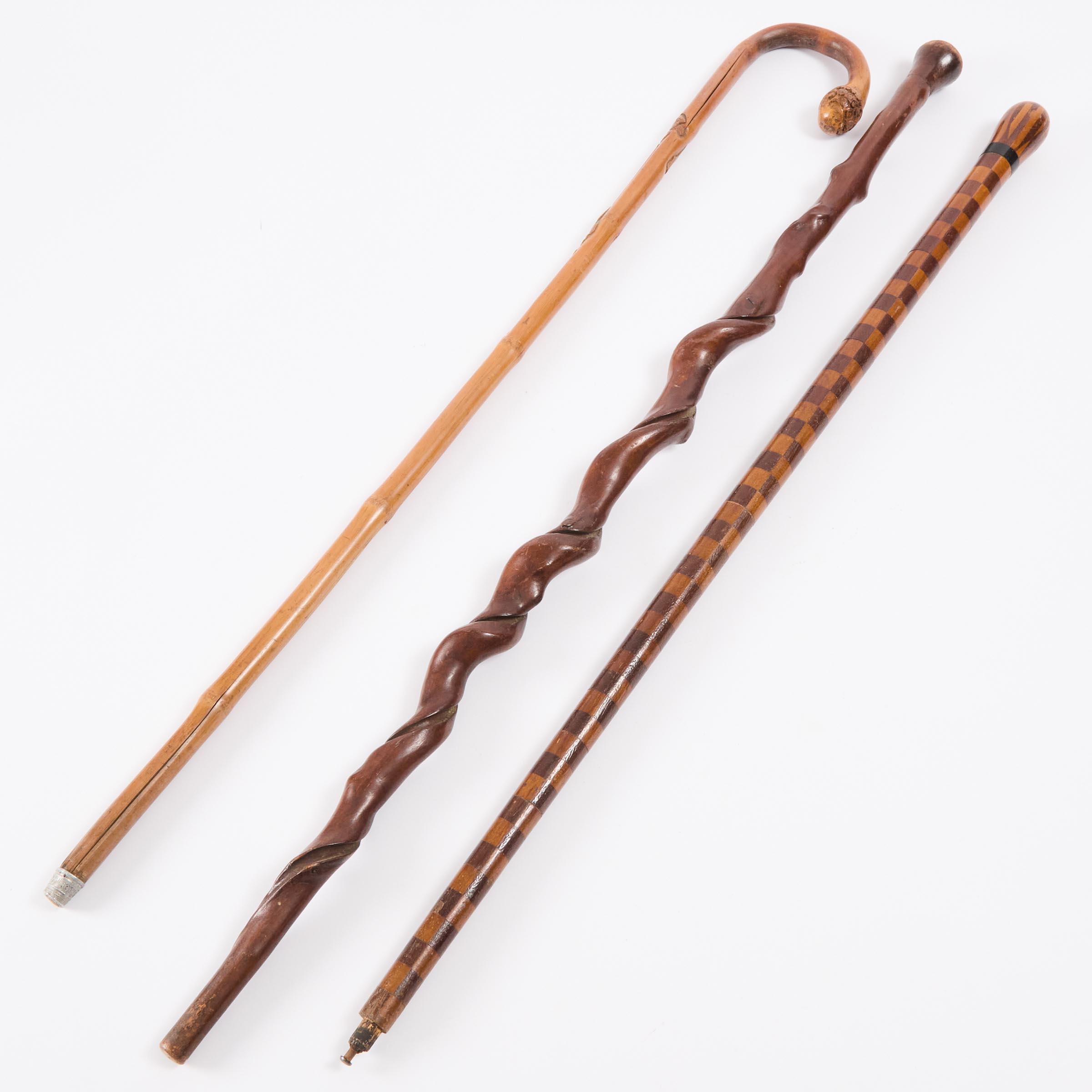 Two Folk Art Walking Sticks and