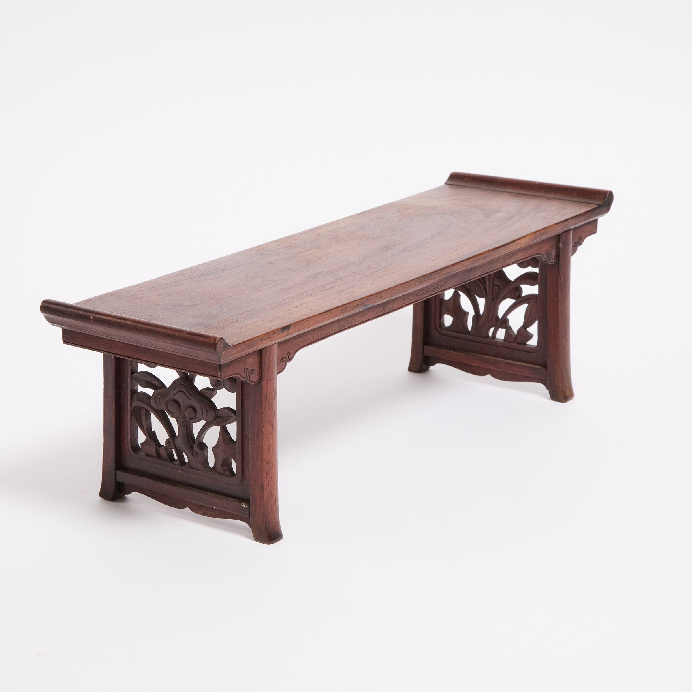 A Huanghuali Trestle-Leg Table