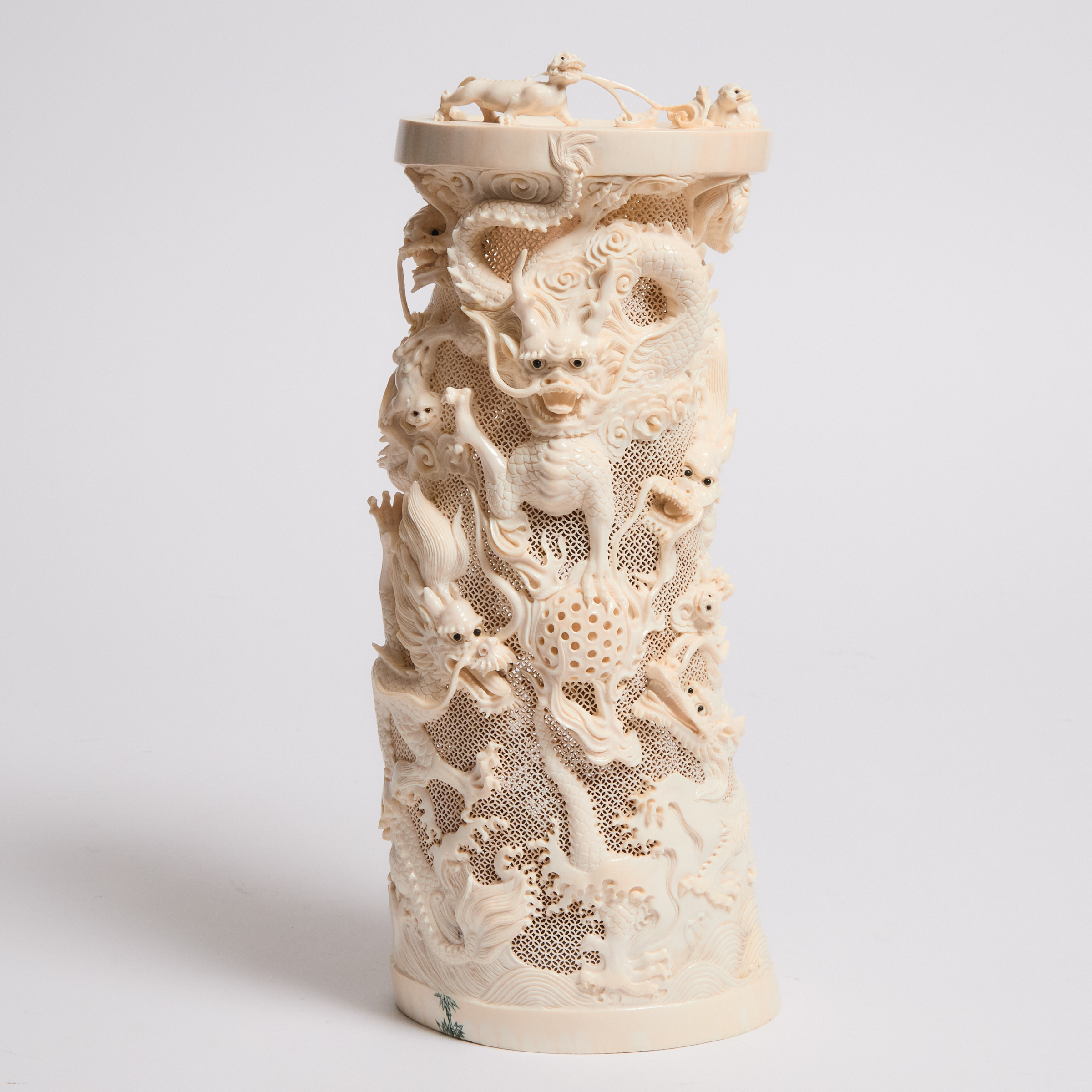 A Large Reticulated Ivory 'Nine