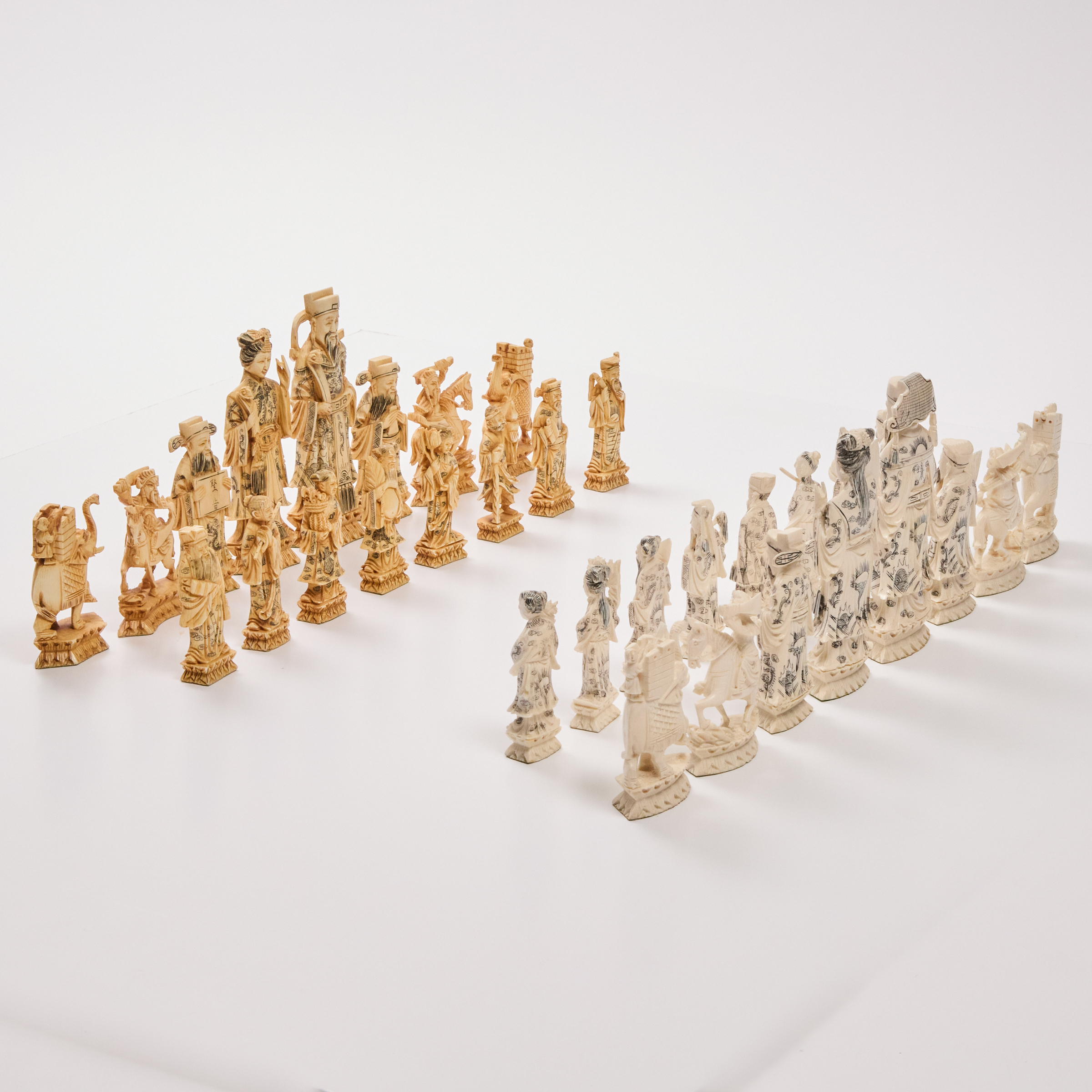 A Chinese Ivory Figural Chess Set,