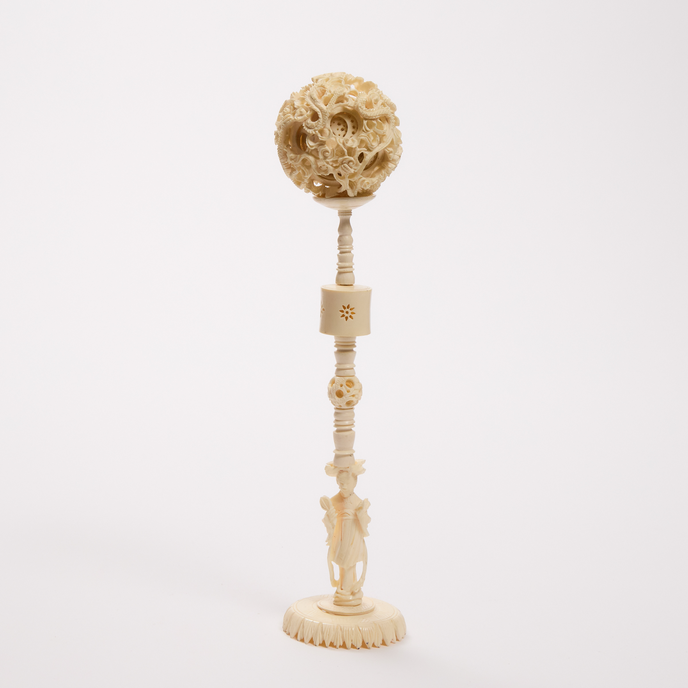 An Ivory Puzzle Ball and Stand,
