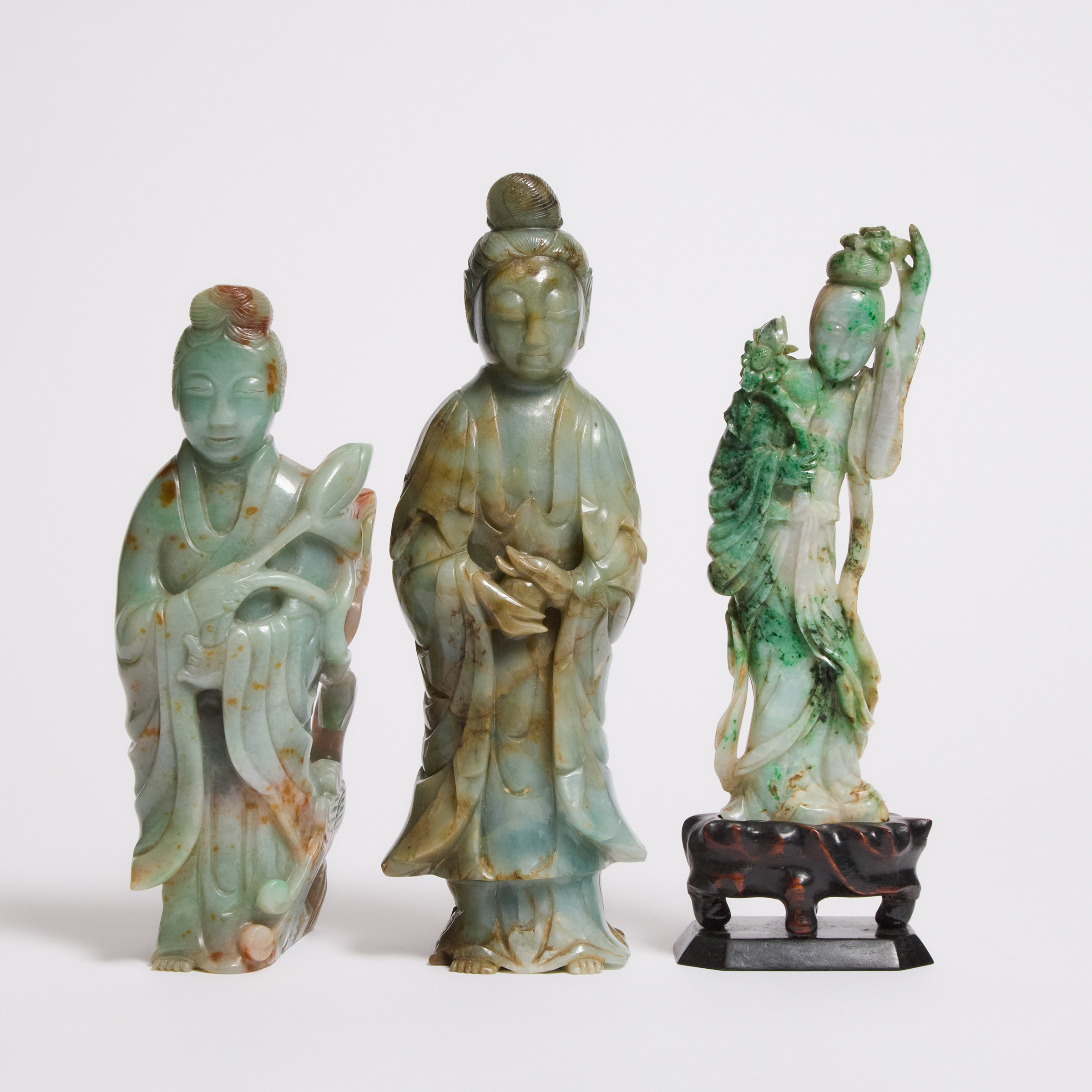A Group of Three Jadeite Figures