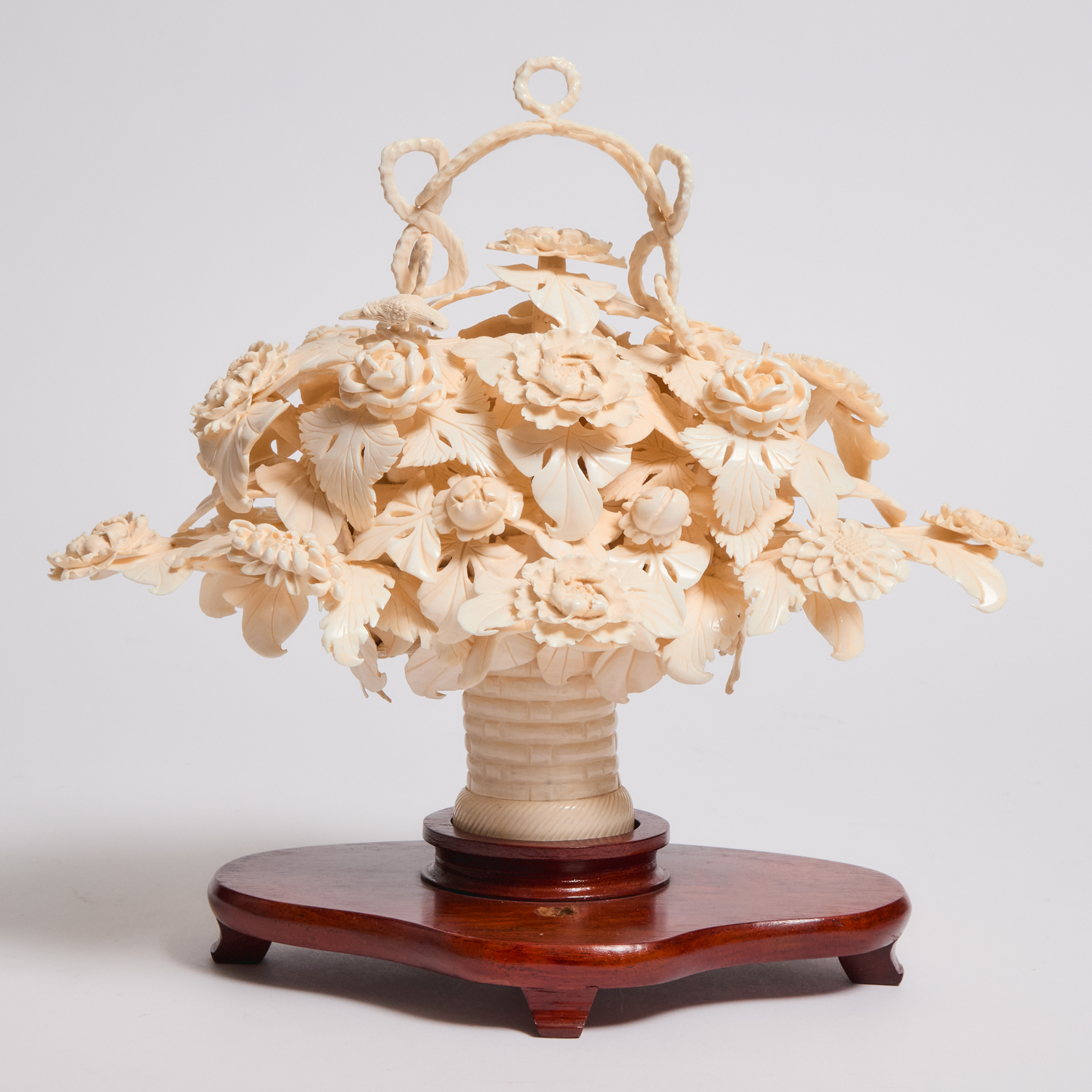 An Ivory Carved Flower Basket,