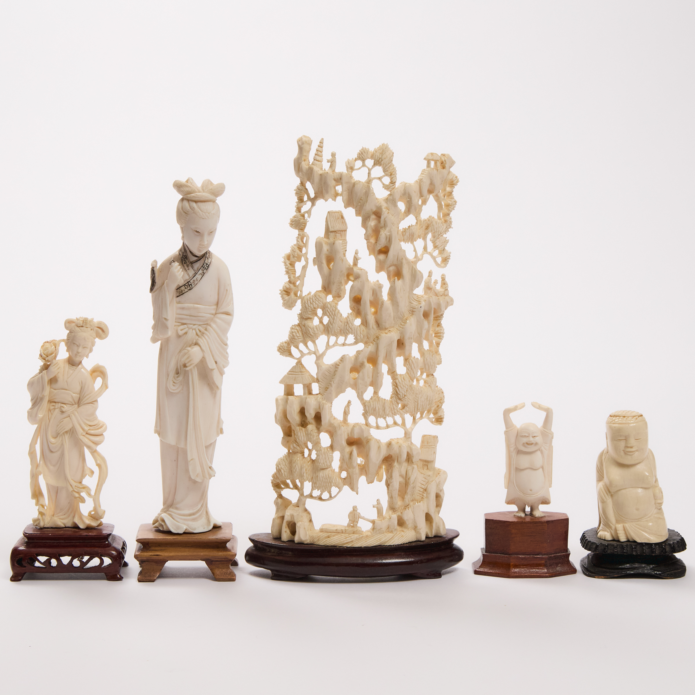 A Group of Five Chinese Ivory Carvings,