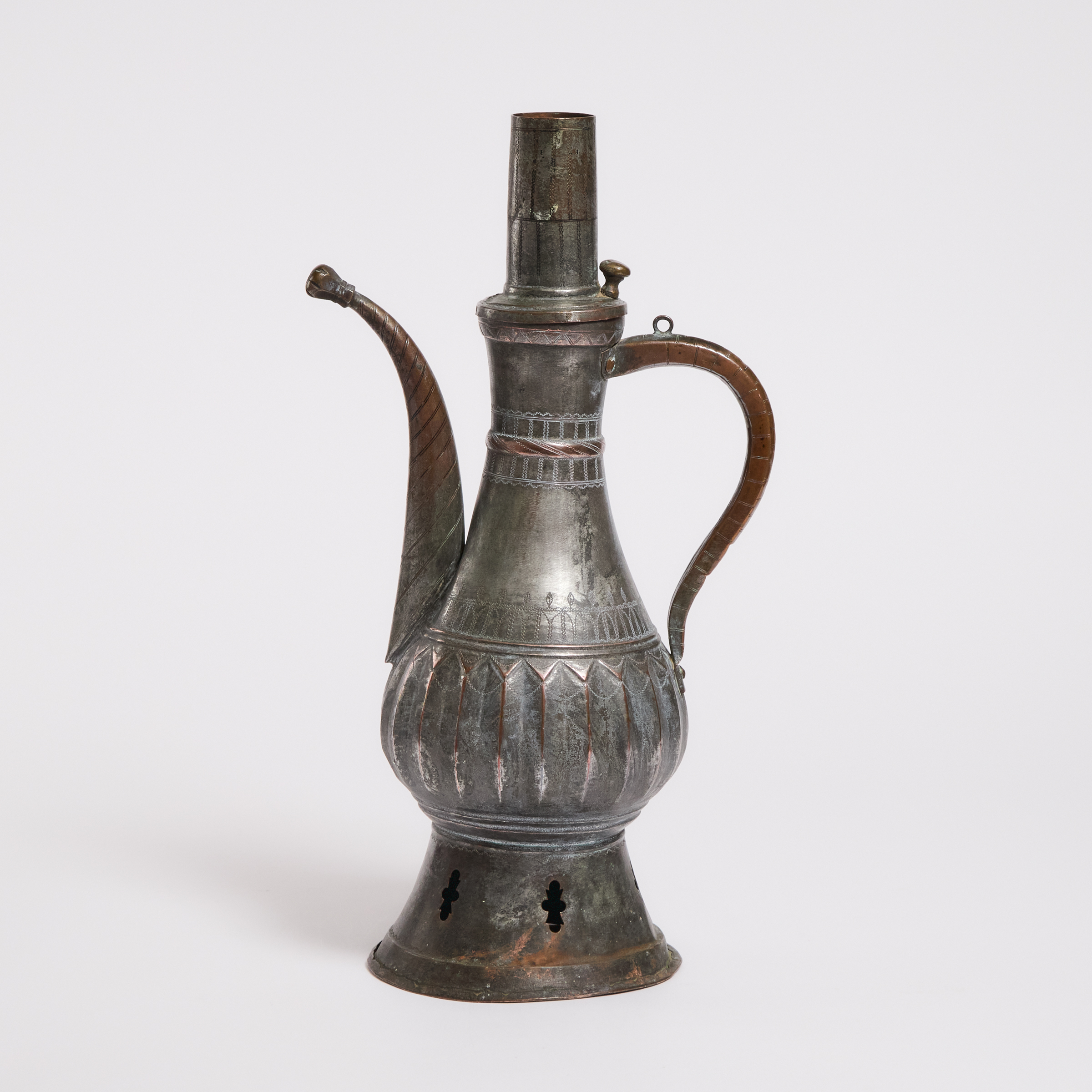 A Large Persian Tinned Copper Ewer,