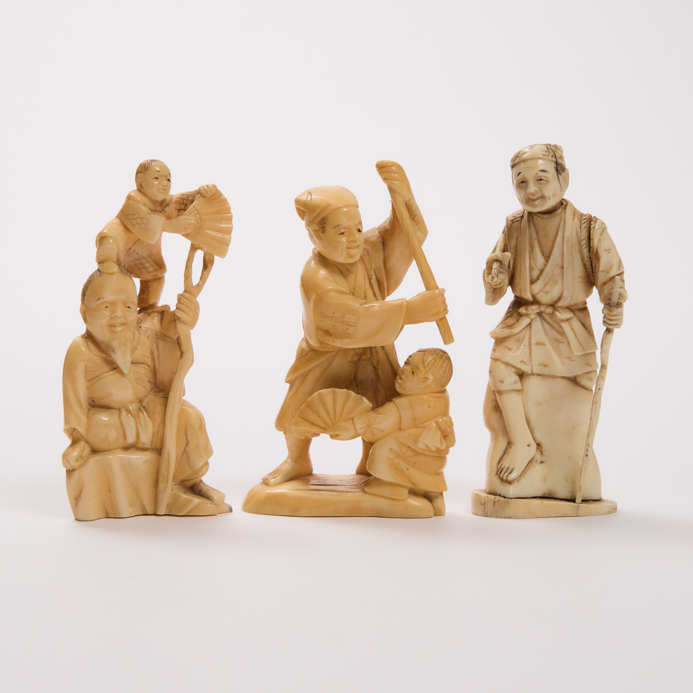 A Group of Three Ivory Okimono,