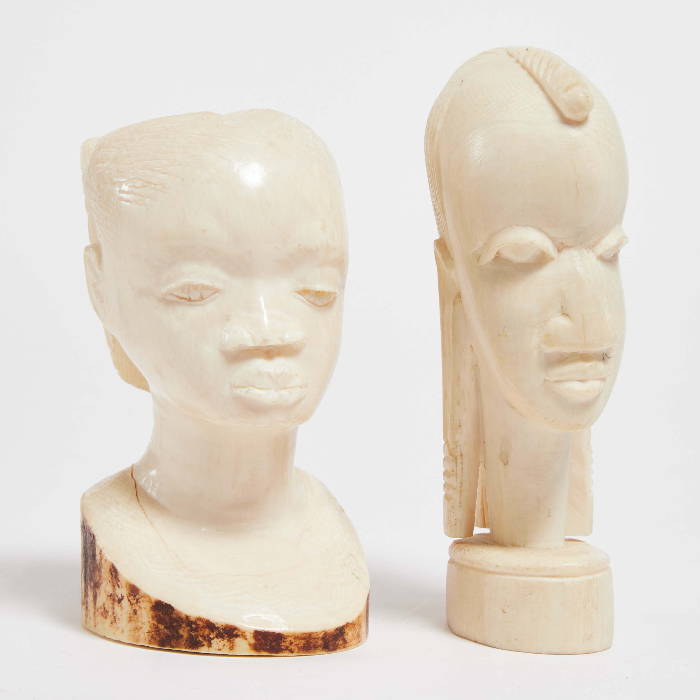 Two African Carved Ivory Busts,
