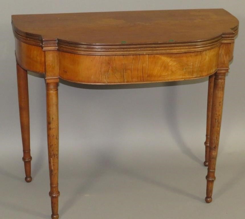 CARD TABLEca. 1820; in cherry with a