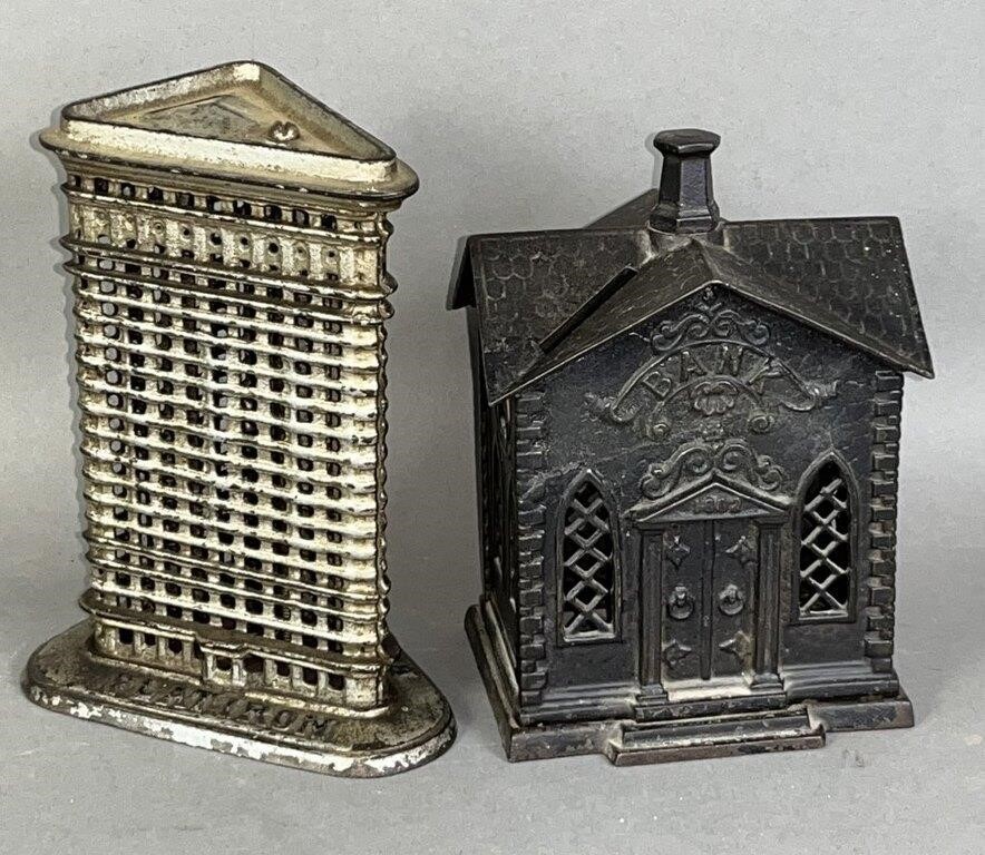 2 CAST IRON BUILDING SHAPED BANKS