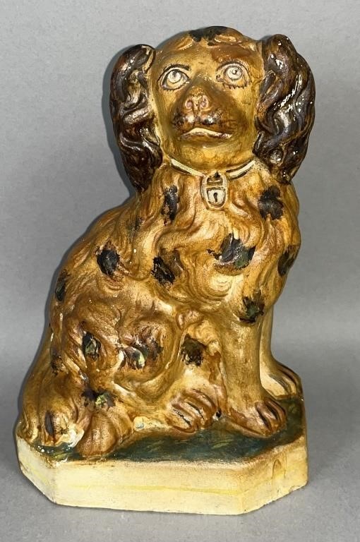 CHALKWARE SEATED SPANIEL FIGURE CA.