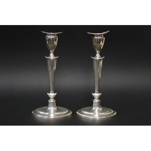 Pair of hallmarked sterling silver candlesticks,