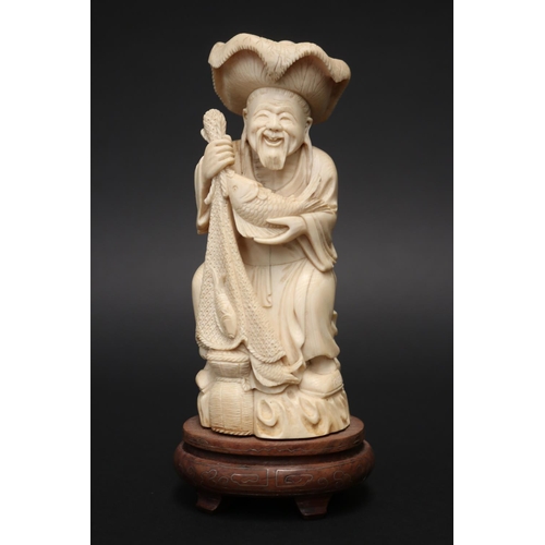 Fine carved ivory figure of an elderly