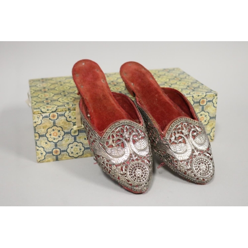 Pair of antique silver mounted slippers,
