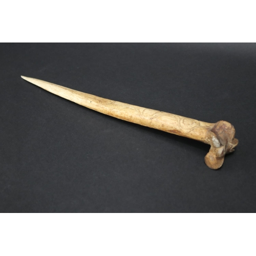 Large old New Guinea carved bone