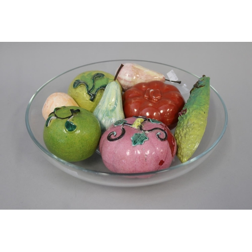 Assorted oriental glazed pottery fruit,