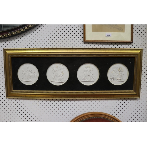 Framed set of four bisque porcelain