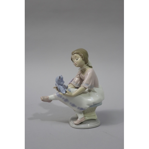 Lladro porcelain seated girl with