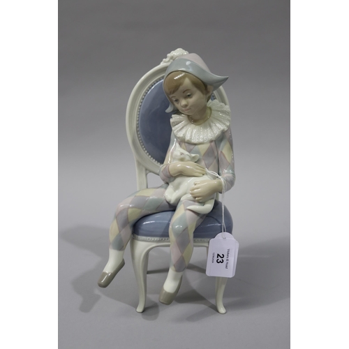 Lladro young Harlequin boy with cat