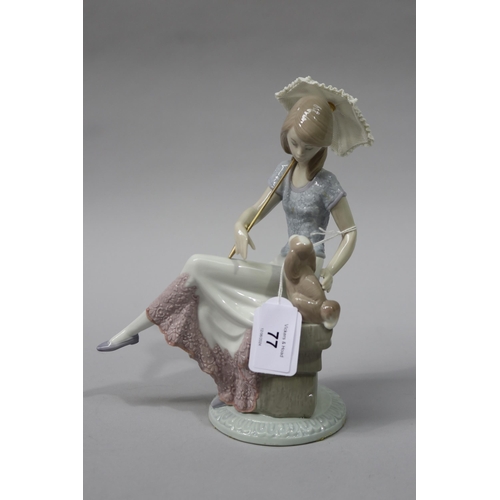 Lladro porcelain girl with dog on bench,
