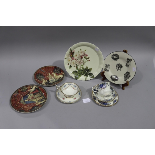 Assorted decorative china plates,