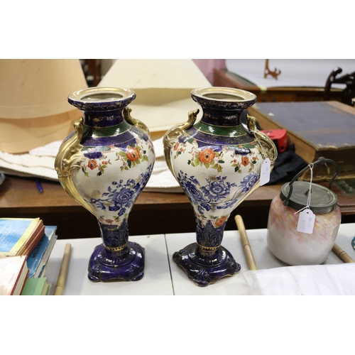 Pair of antique twin handle vases,