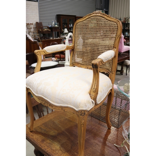 Louis XV style caned backed arm chair