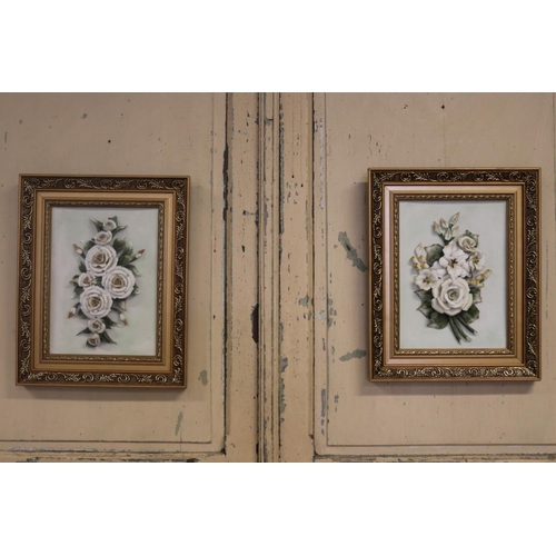 Two framed porcelain sprays of flowers